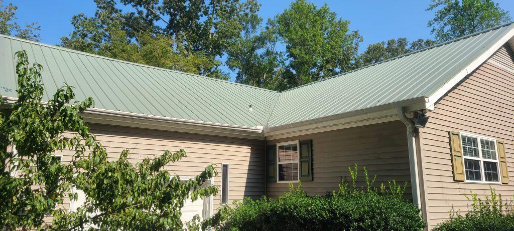 a brown house with a gray roof