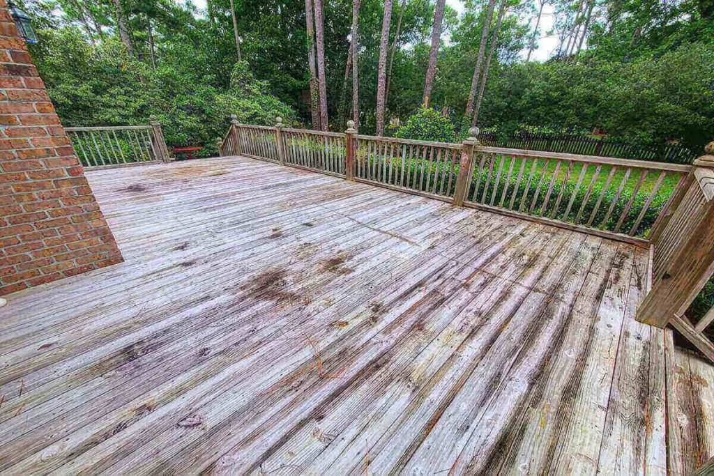 wooden deck before pressure washing